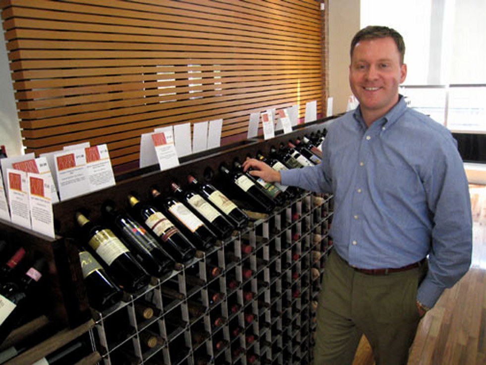 Displaying Wine Bottles In A Tilted Position Creates A Personal Wine Buying Experience in Commercial Wine Rack Buyers Guide photo gallery from Commercial Wine Racks - The World's Finest Wine Racks for Retail Stores