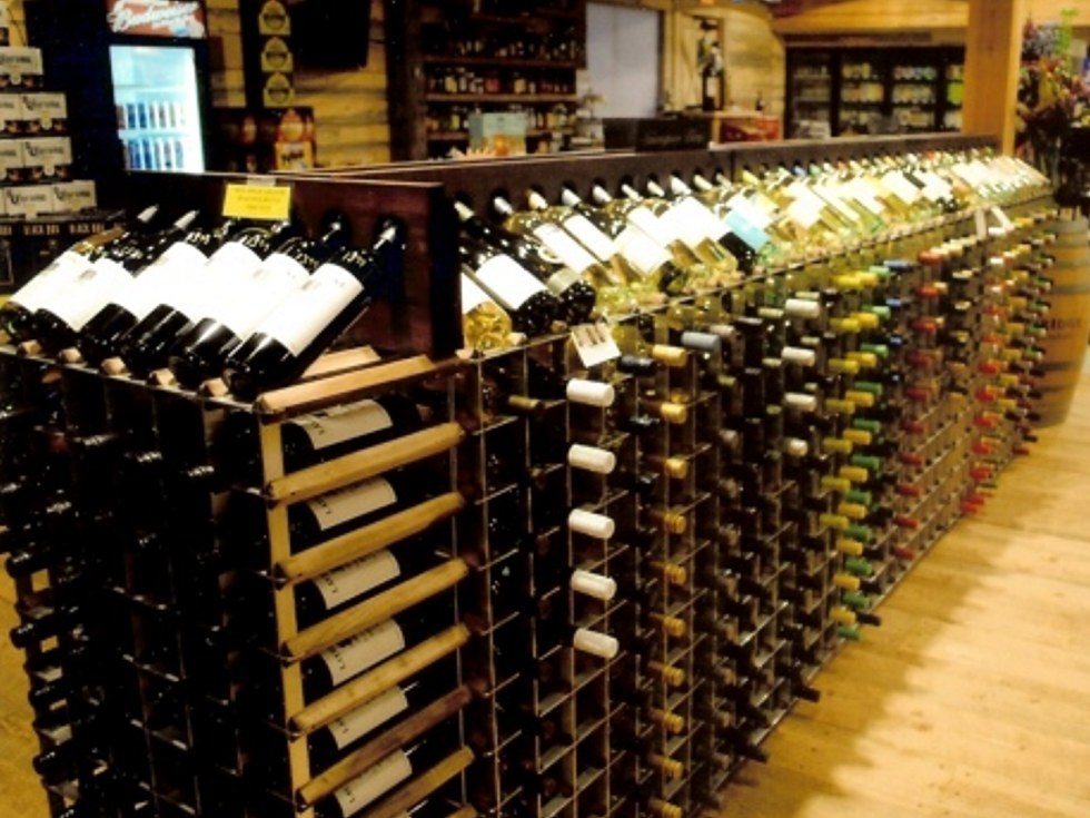 Do End Cap Wine Racks Really Help Sell More Wine? in Commercial Wine Rack Buyers Guide photo gallery from Commercial Wine Racks - The World's Finest Wine Racks for Retail Stores